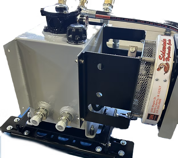 Close-up of Sidewinder Hydraulic Cooler by DH Hydraulics showing internal flow regulator, motor, and heat exchanger core with company label and contact info.