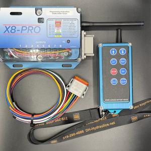 X8Pro wireless remote kit with anodized aluminum receiver box and blue aluminum transmitter, includes 8-wire color-coded harness with connector plug and DH-Hydraulics branded lanyard.