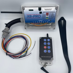 X8Pro wireless transmitter remote with 8 control buttons and antenna, shown with dimensions 2-9/16" wide by 5-11/16" tall, includes carabiner clip and lanyard strap.